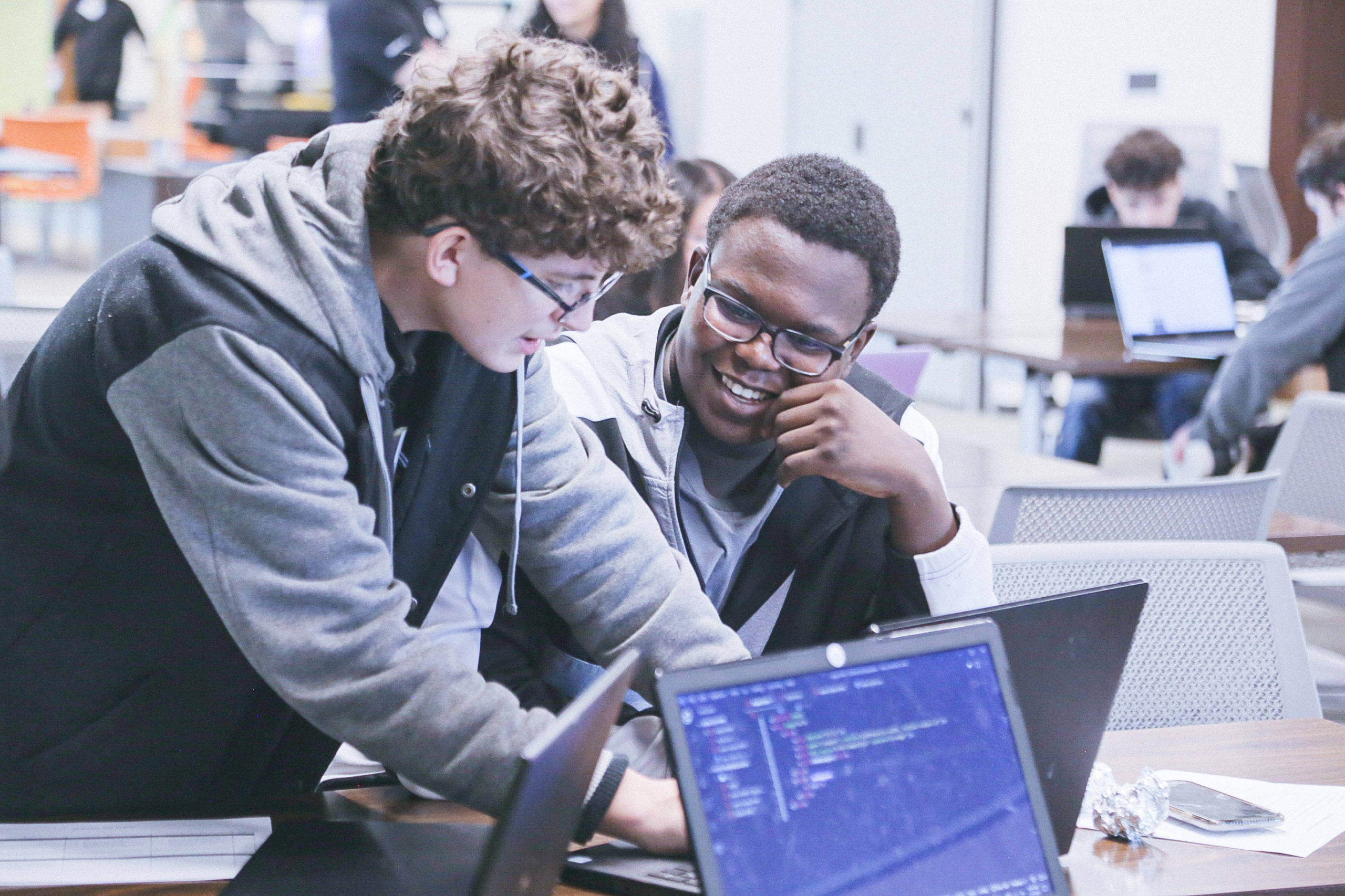 Emmanuel Ahonle (C2C ‘20) and Samuel Gunter (C2C ‘20) working together on their technical project at our first Hackathon prepping for Demo Day!